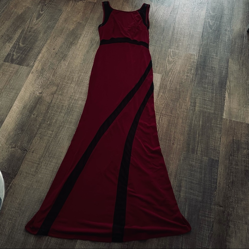 Dark red dress with black mesh details.